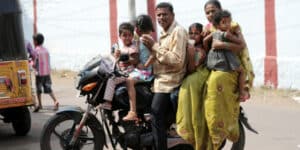 Eight People on a Motorbike