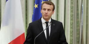 A man slaps the French president