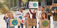 Young people watch climate change meeting