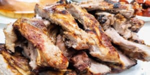 Man cooks meat underground