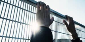 Murderer climbs over prison walls