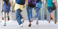 Teenagers run inside Scientology buildings