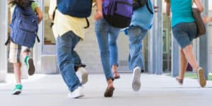 Teenagers run inside Scientology buildings